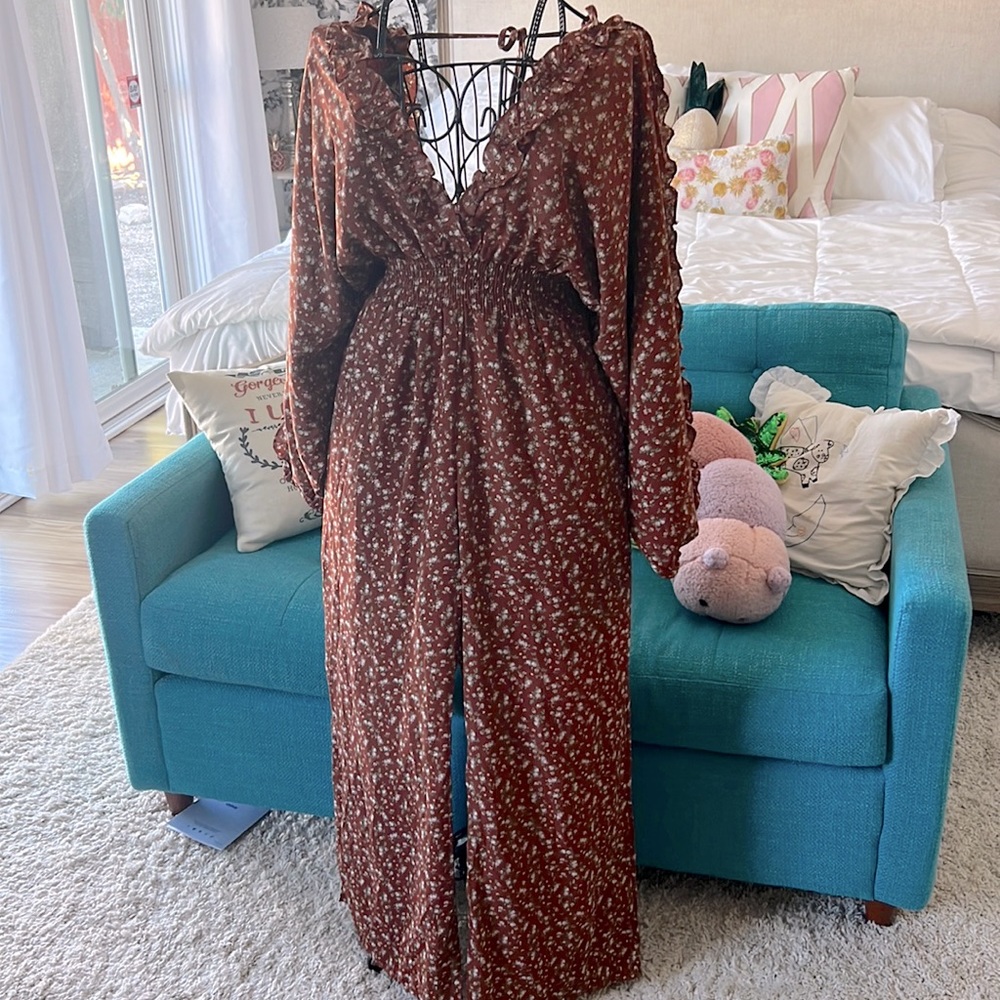 Rust Colored floral jumpsuit, size large, Brand New